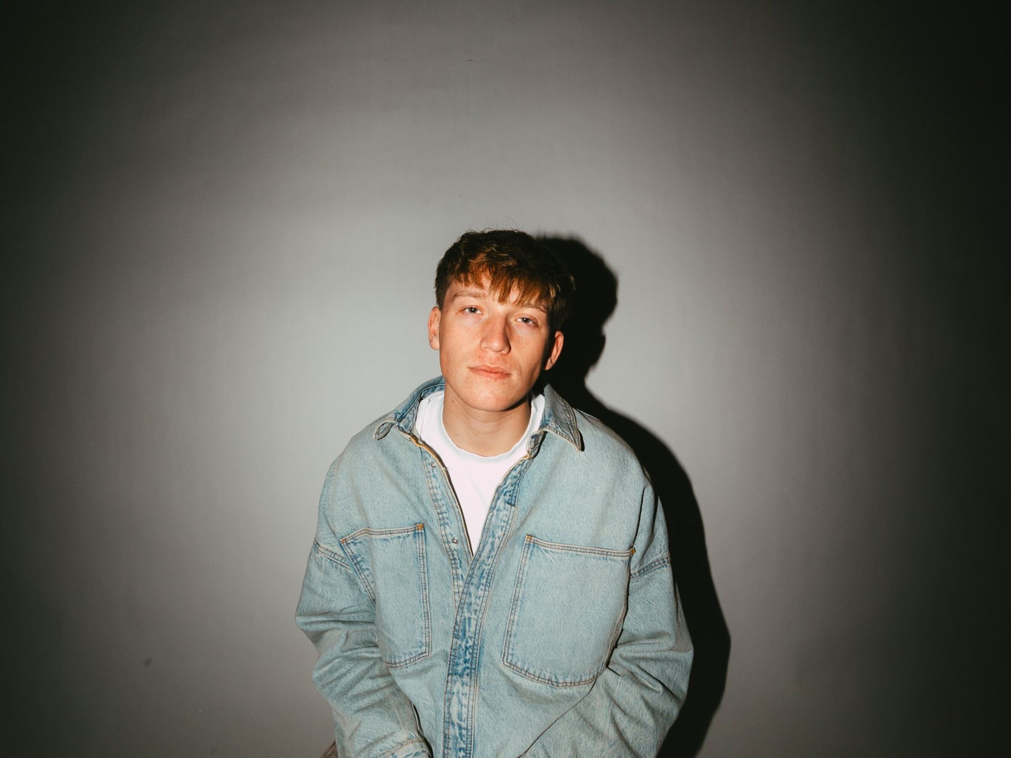 Portrait of Jude Barclay in a denim jacket